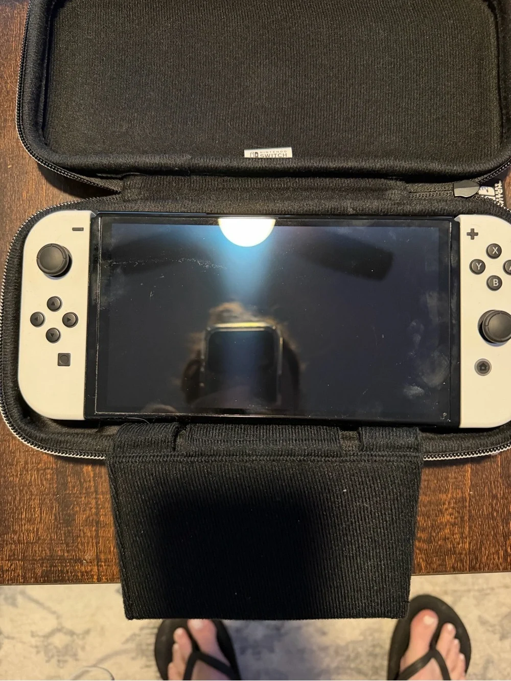 Nintendo Switch OLED Console Bundle in White with Black Case and Two Games